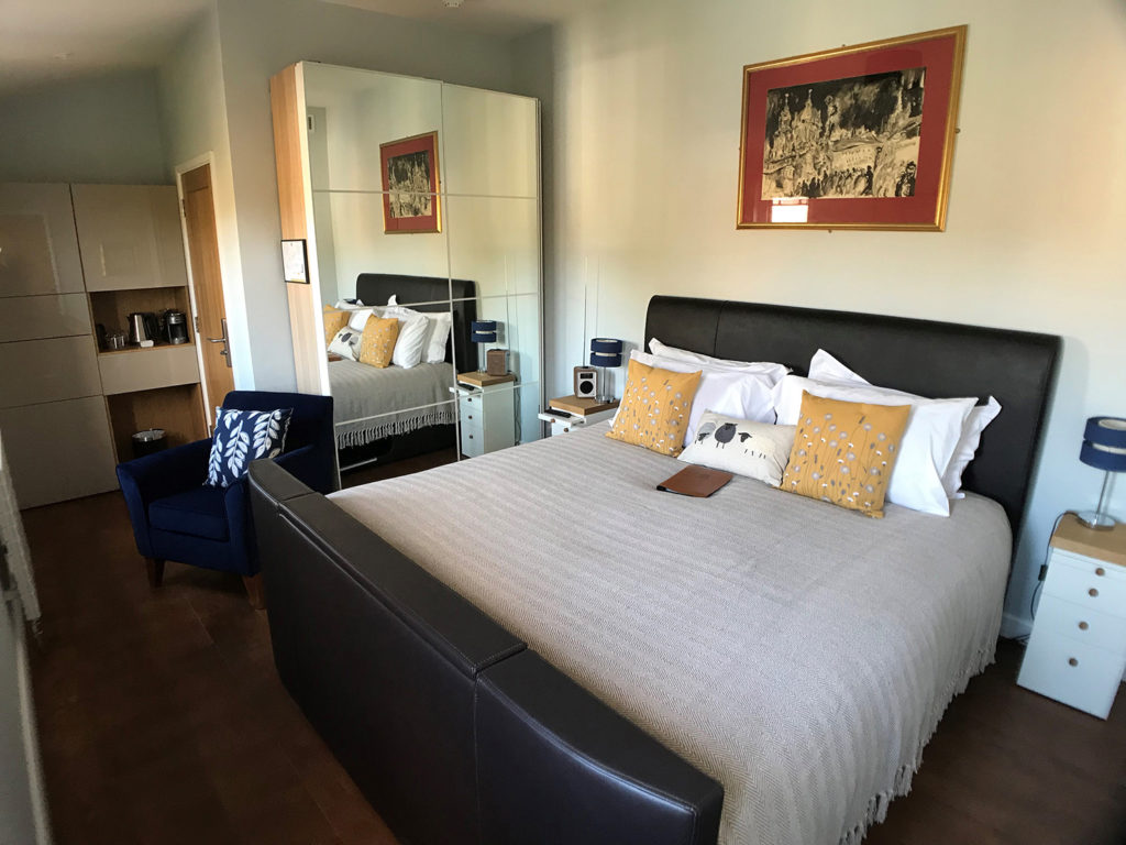 Sampford double bedroom | TV bed at luxury B&B | Super King en-suite bedroom at boutique B&B