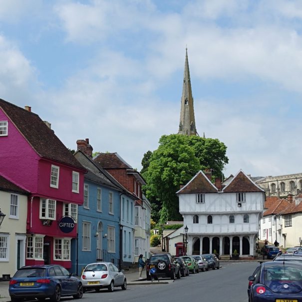 A view Town Street in Thaxted showing Gustav Holst's home, the Guild Hall and the parish church just 10 mins from Piglets Boutique Country Stay