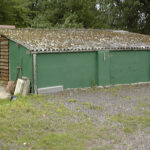 The front of Billy Bembo's boars pen before conversion to a workshop and then the games room at Piglets Boutique Country Stay