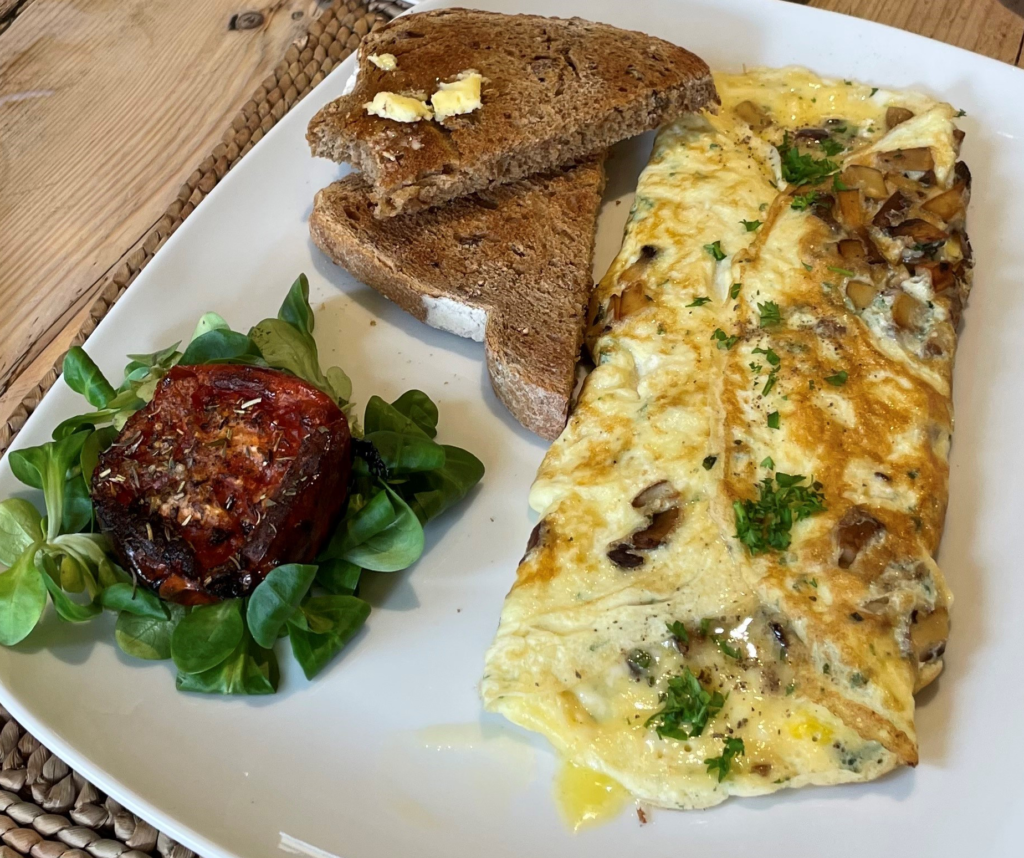 A cheese and mushroom omlette at Piglets Boutique Country Stay